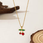 Collier pendentif et boucles d'oreilles  cerise en strass